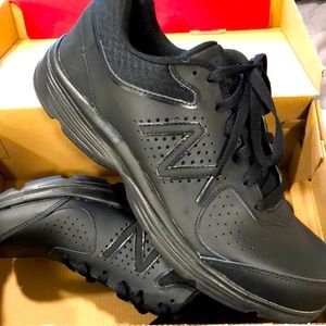 New Balance Men’s 411 walking shoes/ sneakers.
